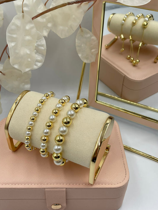 Gold and Pearl Bracelets